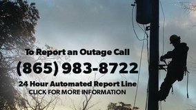Picture of lineman with phone number to report electric outage - 865-983-8722